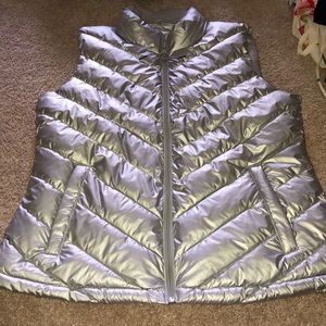 A grey puffy vest